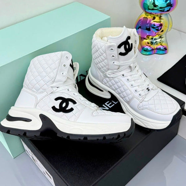 Chanel 2025 Quilted High-Top Sneakers White Black Cowhide 469790