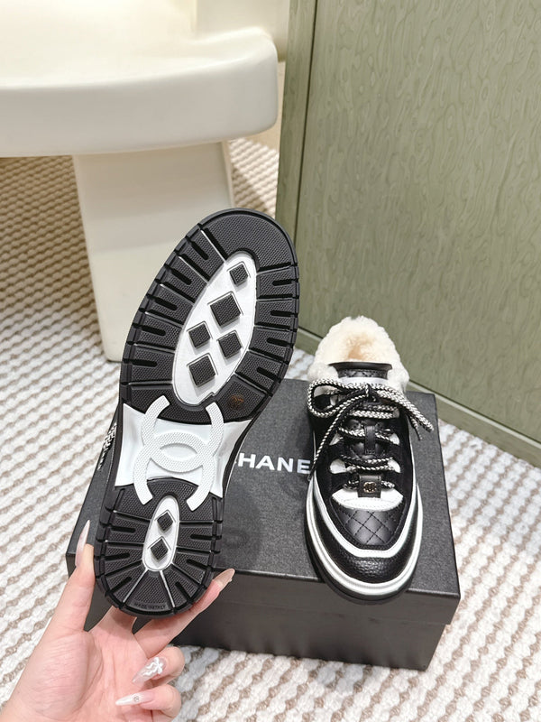 Chanel 26s Thick-Sole Sneakers In Black And White Calfskin With Fur Lining