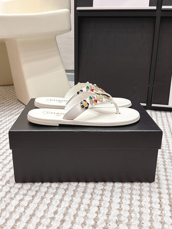 Mules CC 26s en peau de mouton blanche 632363