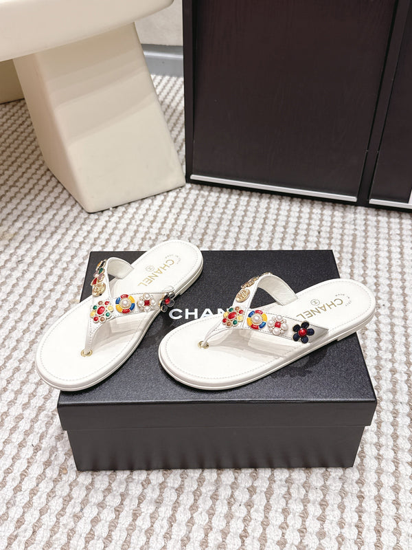 Mules CC 26s en peau de mouton blanche 632363