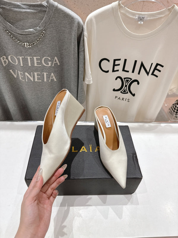 Alaia 25 Cube Wedge Mules Ivory Silk Sheepskin 300080