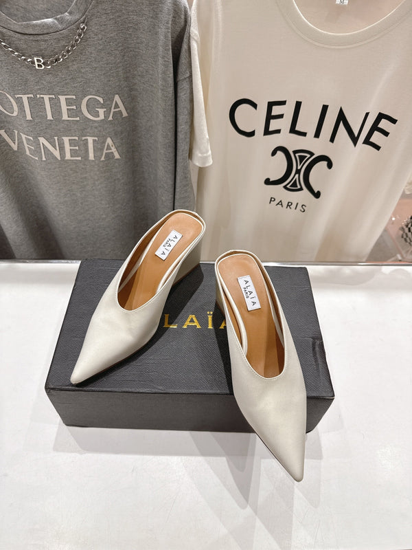 Alaia 25 Cube Wedge Mules Ivory Silk Sheepskin 300080