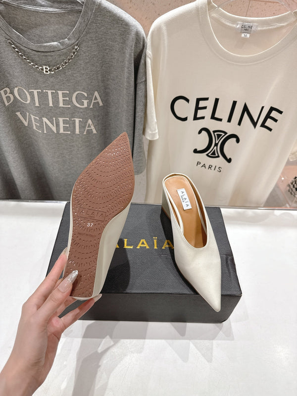 Alaia 25 Cube Wedge Mules Ivory Silk Sheepskin 300080