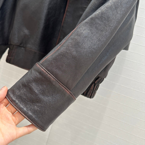 Giacca YSL con spalle ad angolo retto in pelle di agnello nera e marrone