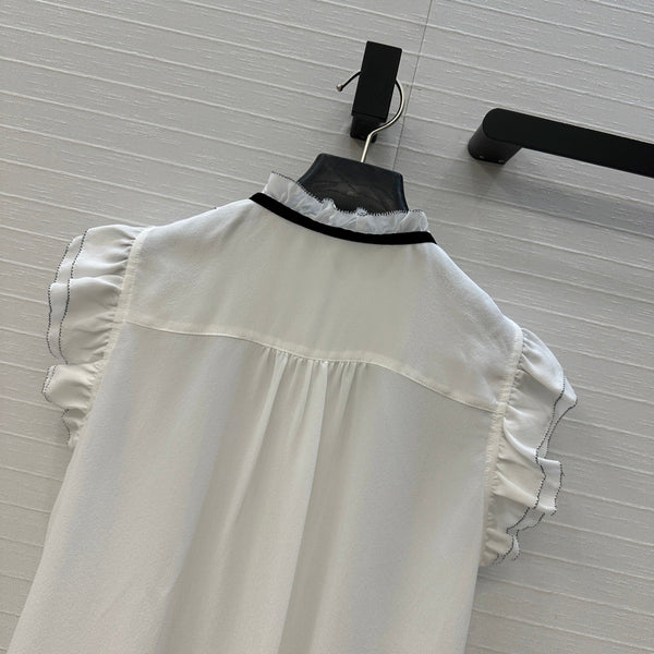 Camicia senza maniche con lacci CD in seta bianca