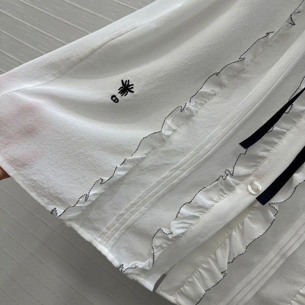 Camicia senza maniche con lacci CD in seta bianca