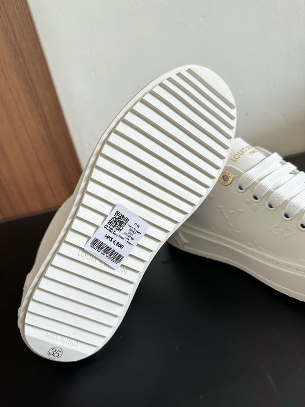 Sneakers LV Time Out in pelle di vitello monogrammata bianca e marrone