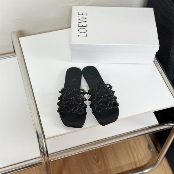 Petal Anagram Slide in Black Soft Calfskin 273512