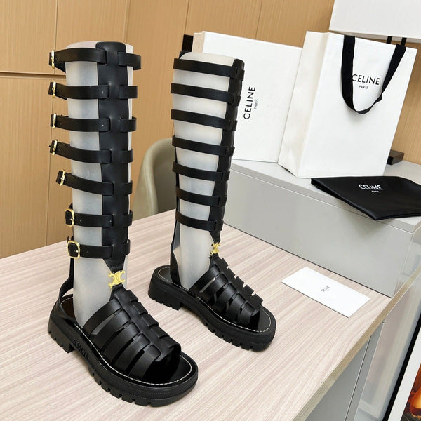 Triomphe high boots leather buckles Black