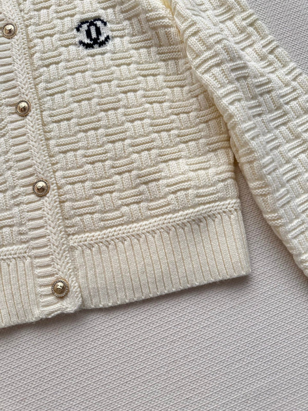 Chanel Cardigan en maille avec logo double C en laine crème 2025