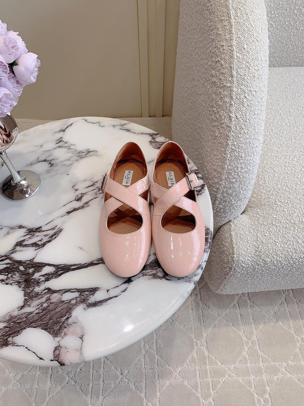 ALAIA CRISS CROSS BALLET FLAT IN BABY PINK LAMBSKIN WITH SILVER HARDWARE