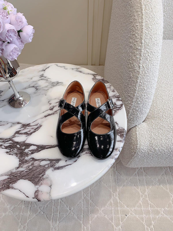 ALAIA CRISS CROSS BALLET FLAT IN BLACK LAMBSKIN WITH SILVER HARDWARE