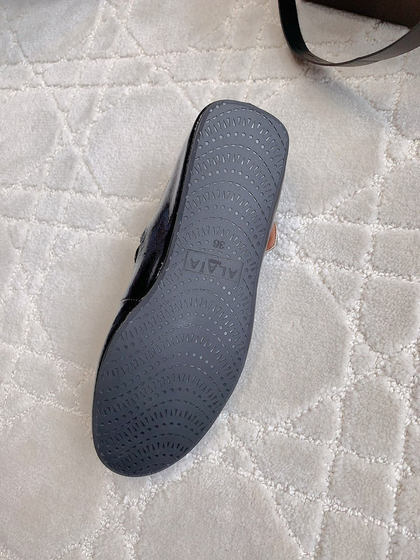 ALAIA CRISS CROSS BALLET FLAT IN BLACK LAMBSKIN WITH SILVER HARDWARE