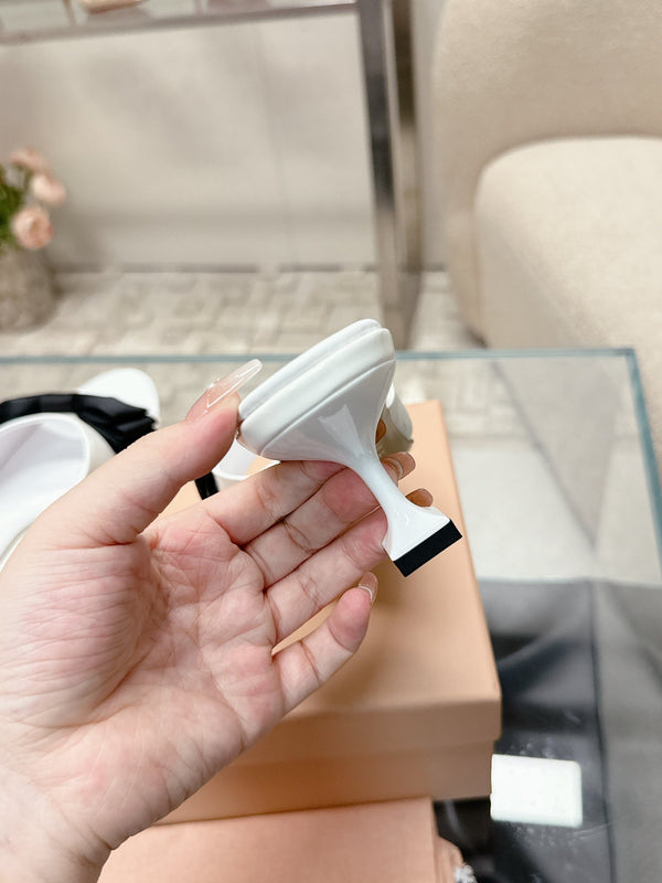 Miu Mordoré Black Bows Mules 50mm White Cowhide 445522