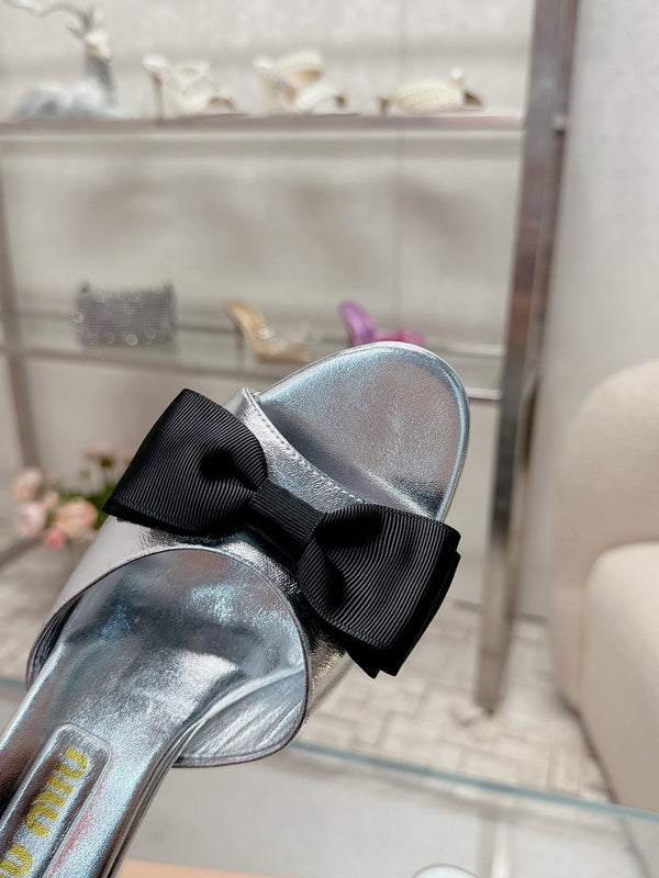 Miu Mordoré Black Bows Mules 50mm Sliver Cowhide 445519