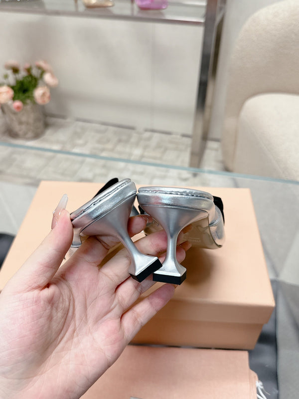 Miu Mordoré Black Bows Mules 50mm Sliver Cowhide 445519