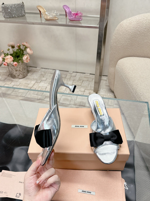 Miu Mordoré Black Bows Mules 50mm Sliver Cowhide 445519