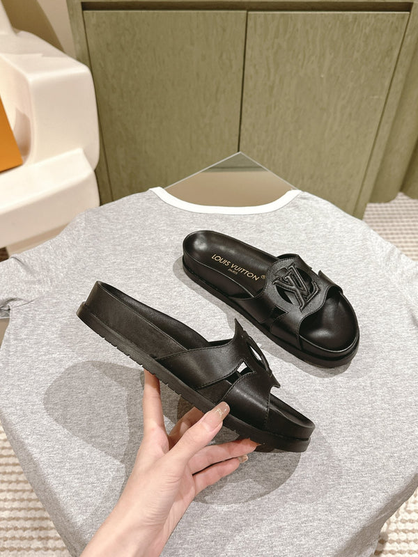 lv sandal isola flat mule black calfskin