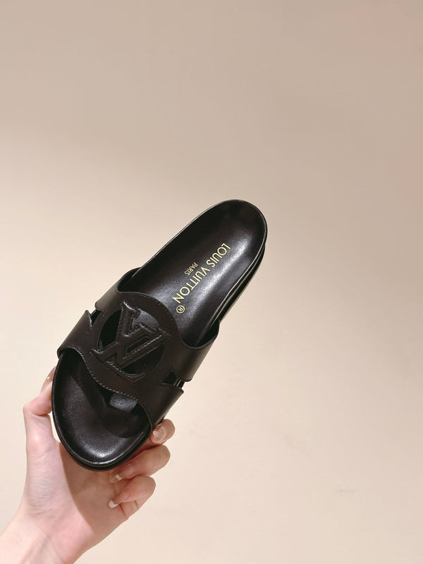 lv sandal isola flat mule black calfskin