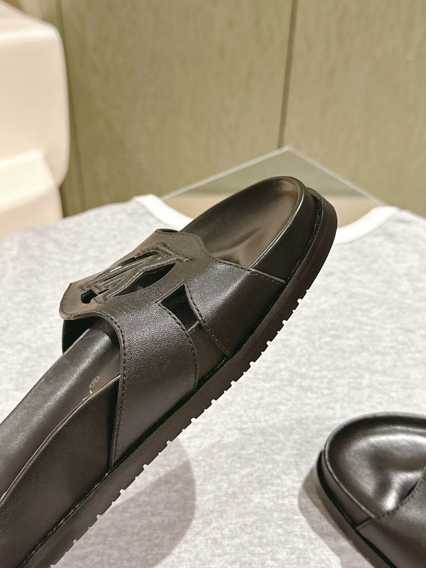 lv sandal isola flat mule black calfskin
