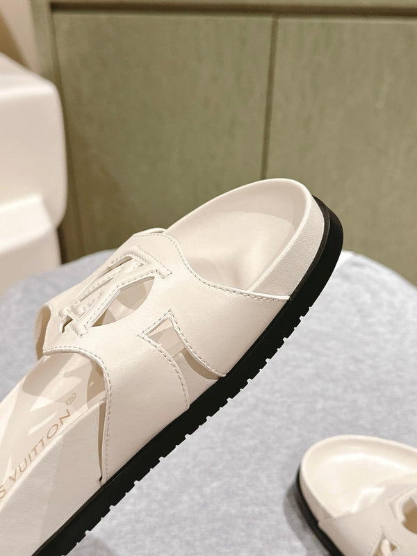 lv sandal isola flat mule cream calfskin