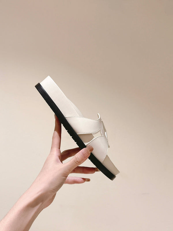 lv sandal isola flat mule cream calfskin