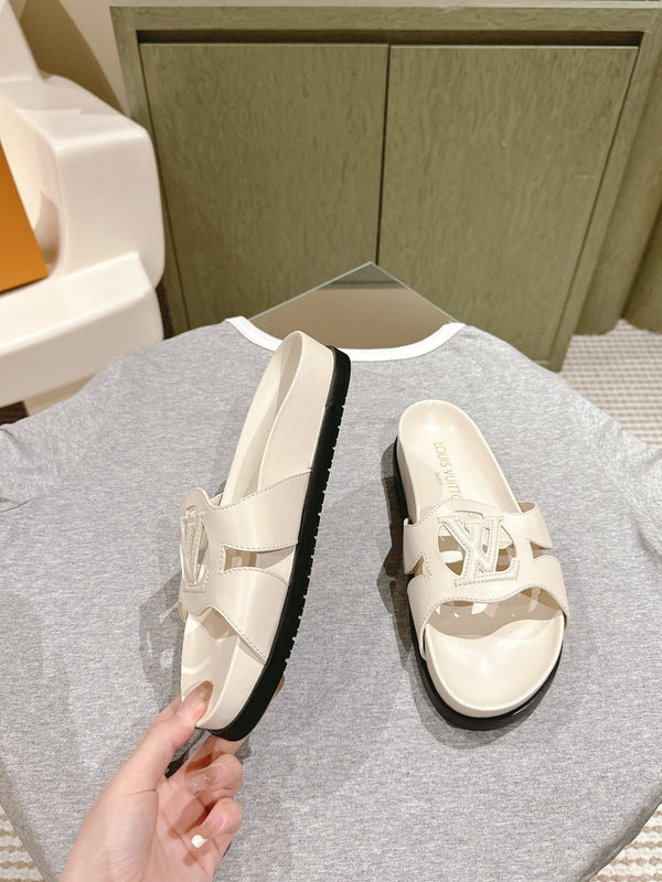lv sandal isola flat mule cream calfskin