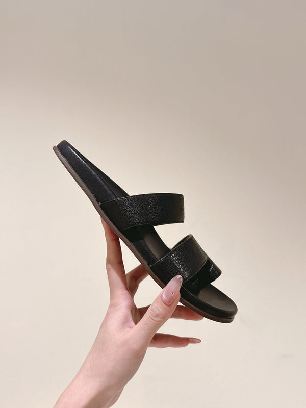 The Row Hugh Slides Black Cowhide Rubber 451281