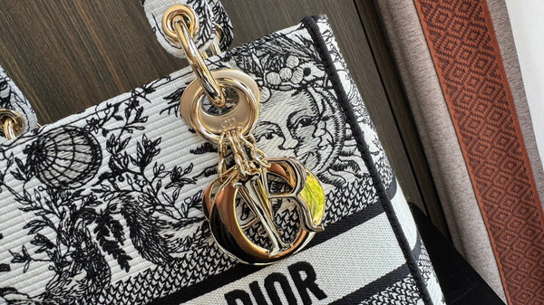 tela da ricamo sole bianco e nero da donna media 24