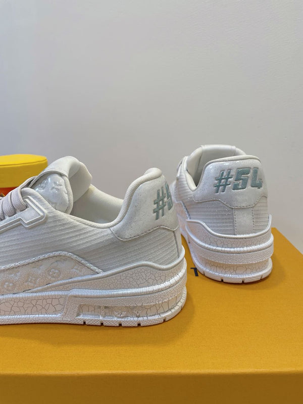 LV TRAINER MAXI SNEAKER IN WHITE EMBOSSED CALFSKIN