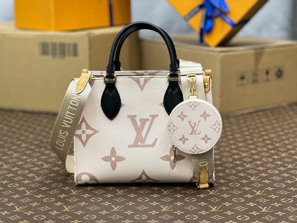 onthego pm 25 cream monogram empreinte embossed calfskin bagcharm