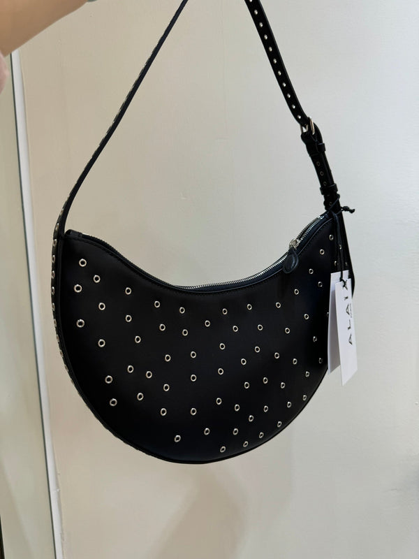 ONE PIECE DEMI LUNE BAG 31 IN BLACK SHEEPSKIN EYELET DETAILING