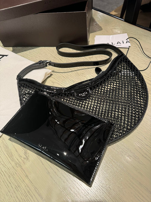 ONE PIECE DEMI LUNE BAG 31 IN BLACK FISHNET