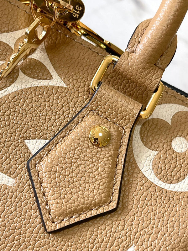 SPEEDY BANDOULIÈRE 20 IN PELLE EMPREINTE MONOGRAM TÈ AL LATTE