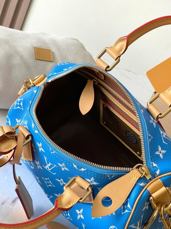 SPEEDY P9 BANDOULIÈRE 25 IN TELA MONOGRAM BLU CON FERRAMENTA ORO