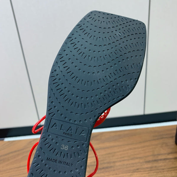 SANDALI ALAIA BANQUET CON ZEPPA IN PELLE DI AGNELLO ROSSO CILIEGIA CON CUORE ROSSO