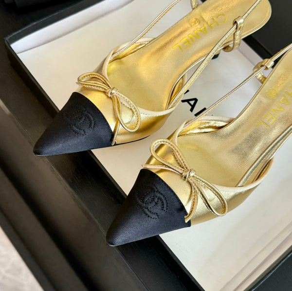 Acc slingbacks 65 bow gold metalic lambskin black grosgrain