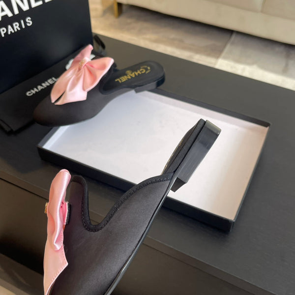 BIG BOW FLAT MULE SANDALS IN BLACK MIX PALE PINK SILK