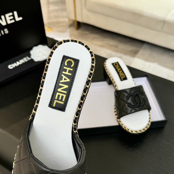 PANTOFOLA ALTE FLATFORM IN PELLE DI MONTONE GOFFRATA NERA