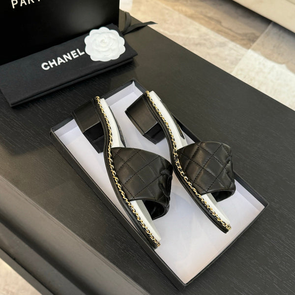 PANTOFOLA ALTE FLATFORM IN PELLE DI MONTONE GOFFRATA NERA