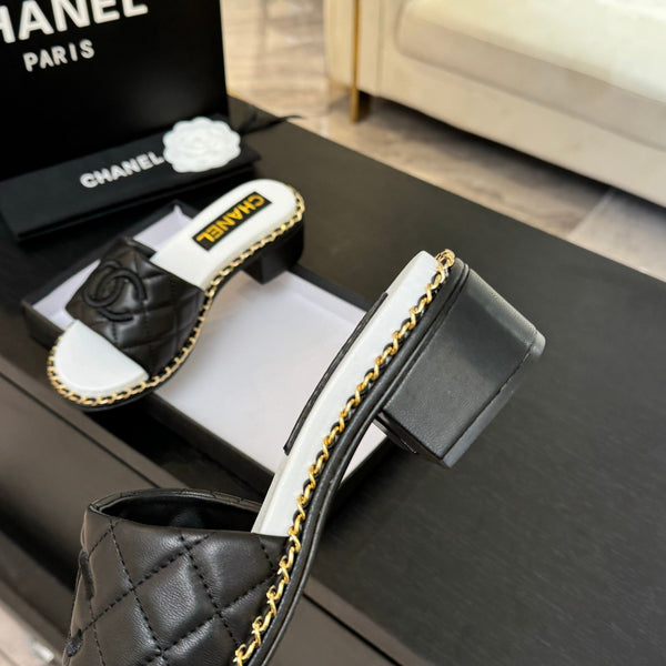 PANTOFOLA ALTE FLATFORM IN PELLE DI MONTONE GOFFRATA NERA