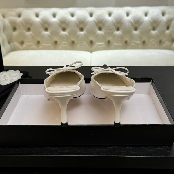 CC 26s Métiers d'Art Pointed-Toe Mule White Black Sheepskin 700619