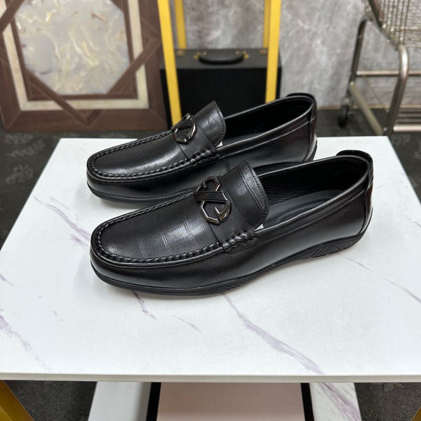 Mocassino da uomo GG in pelle di vacchetta goffrata nera 532512