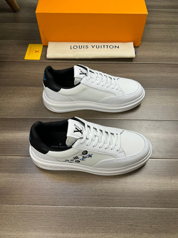 LV TRAINER SNEAKER WHITE AND BLACK CALFSKIN AND BREATHABLE FABRIC