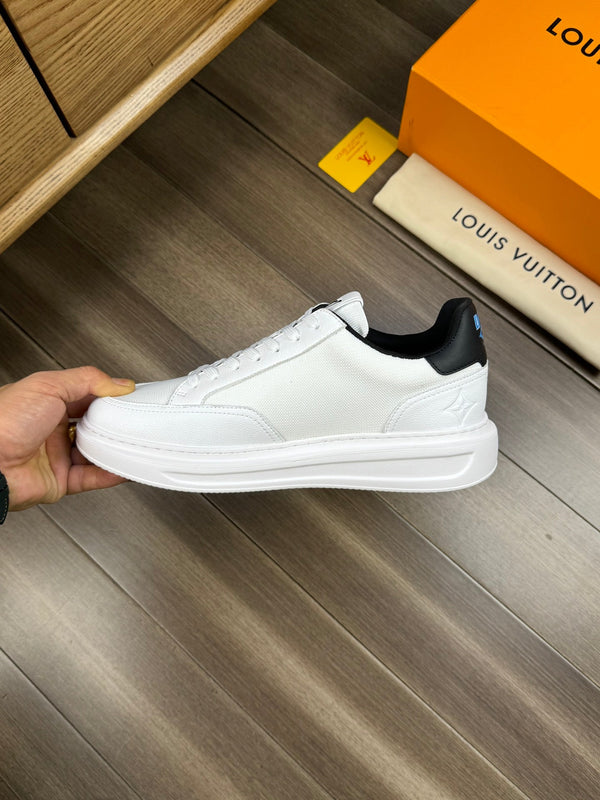 LV TRAINER SNEAKER WHITE AND BLACK CALFSKIN AND BREATHABLE FABRIC