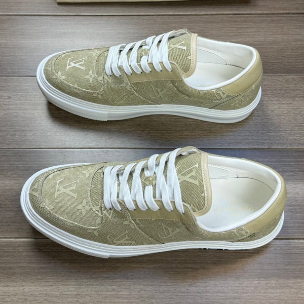 LV TRAINER SNEAKER IN OLIVE YELLOW MONOGRAM DENIM