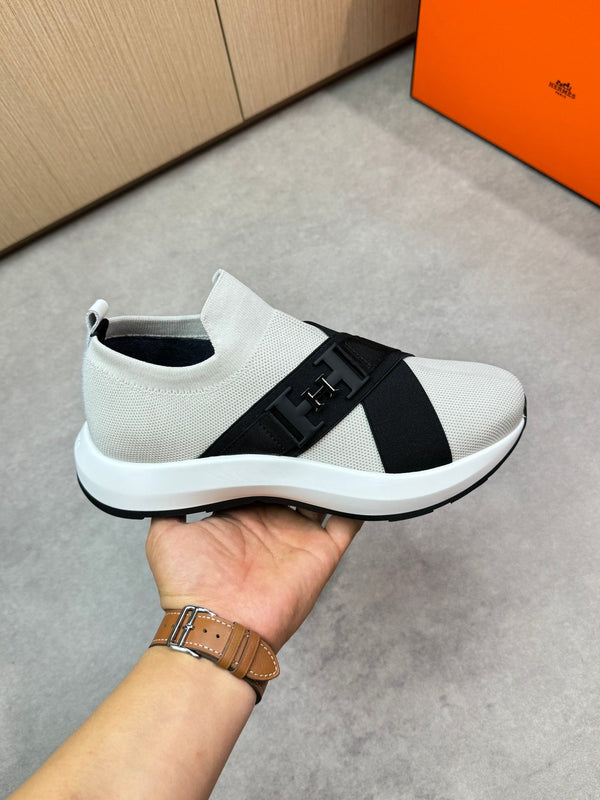 Sneaker slip-on da uomo HM in tessuto lavorato a maglia nero 643377