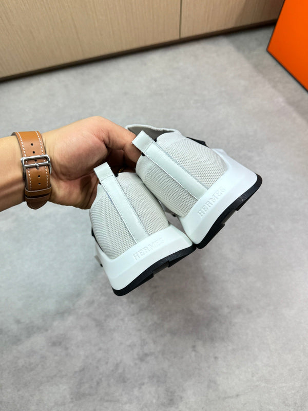 Sneaker slip-on da uomo HM in tessuto lavorato a maglia nero 643377