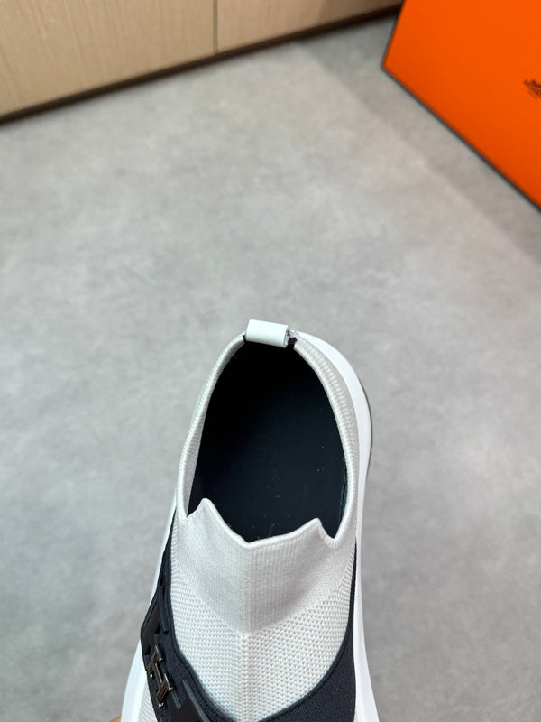 Sneaker slip-on da uomo HM in tessuto lavorato a maglia nero 643377