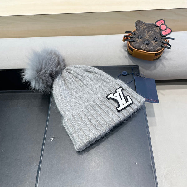 BERRETTO IN MAGLIA DI LANA GRIGIA 413367